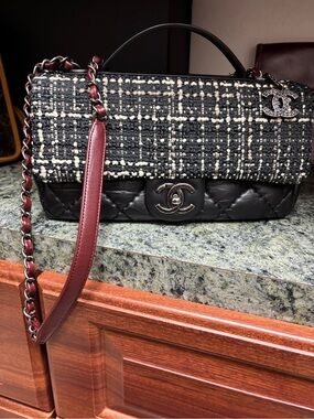 CHANEL Black Tweed & Leather Quilted flap bag. Super cute!!